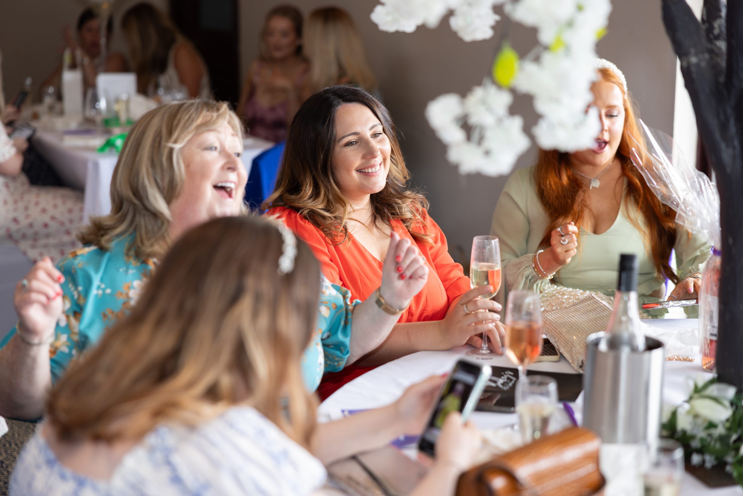 Attendees singing at an Ardgowan Hospice event.